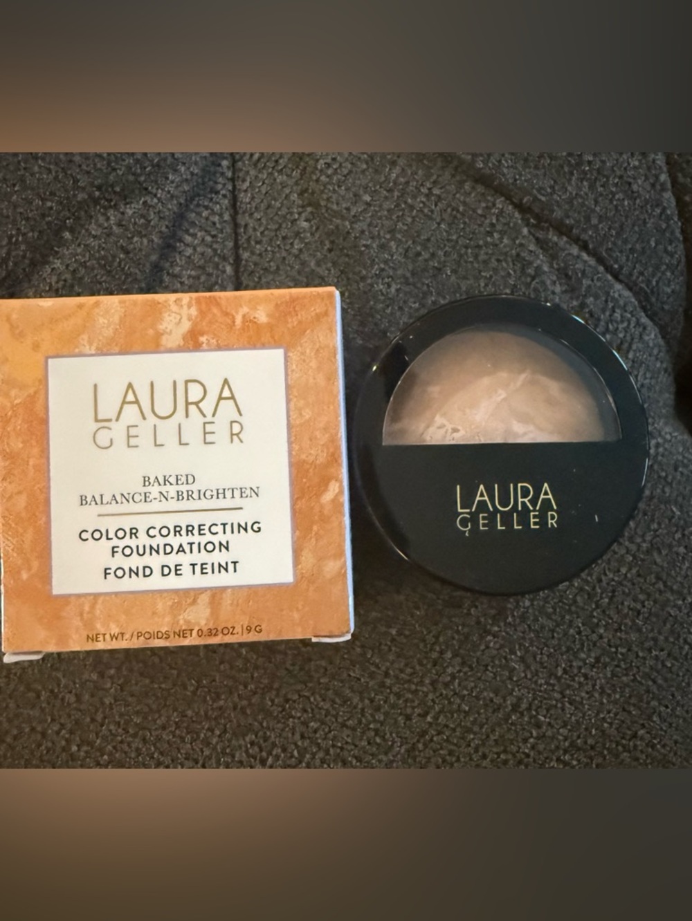 Laura Geller Light Shade Compact in Yellow-Orange Packaging